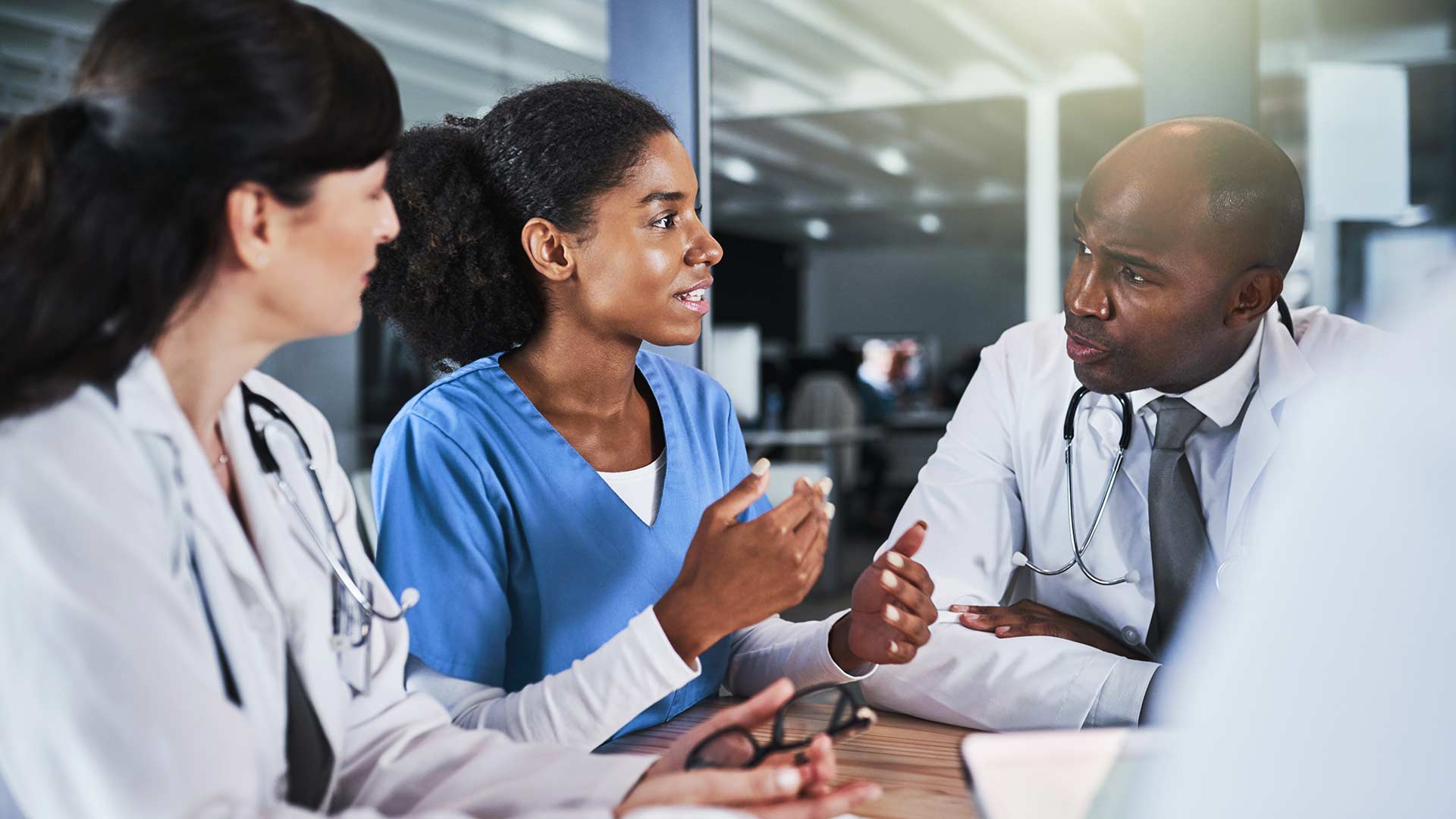 Healthcare professionals in conversation